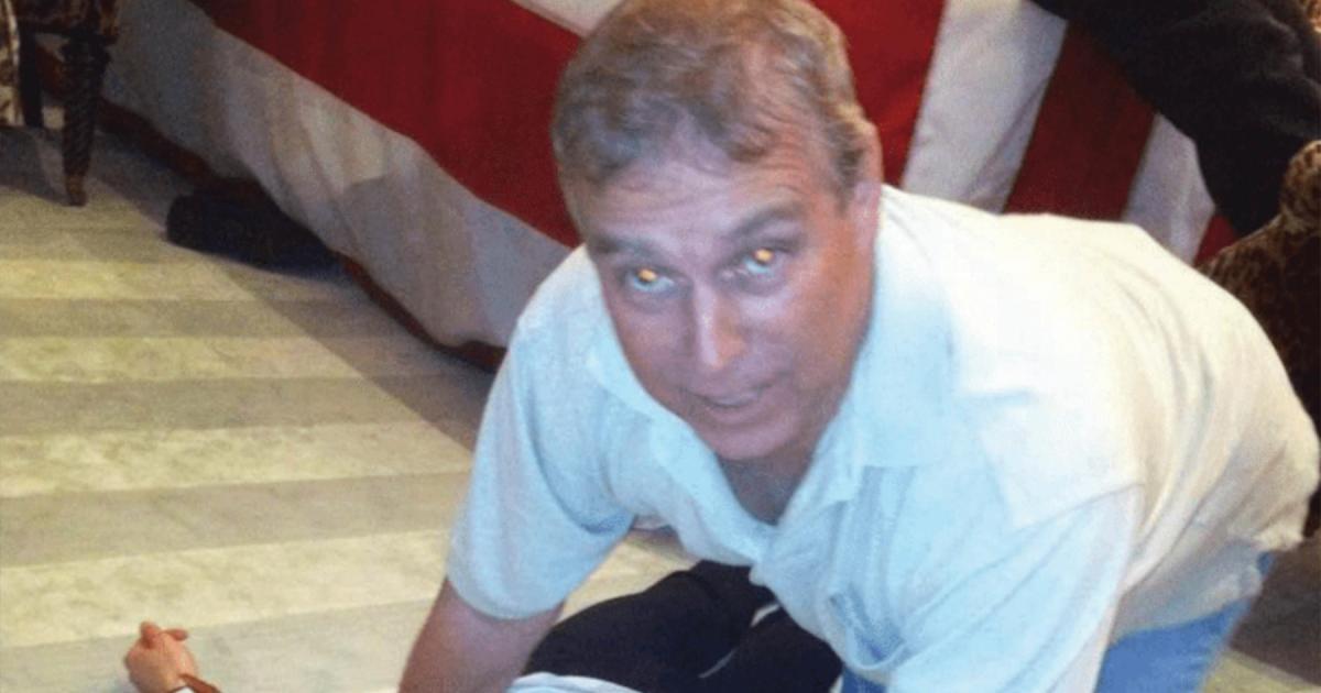 Andrew 'pictured crouched over woman' in Epstein files
