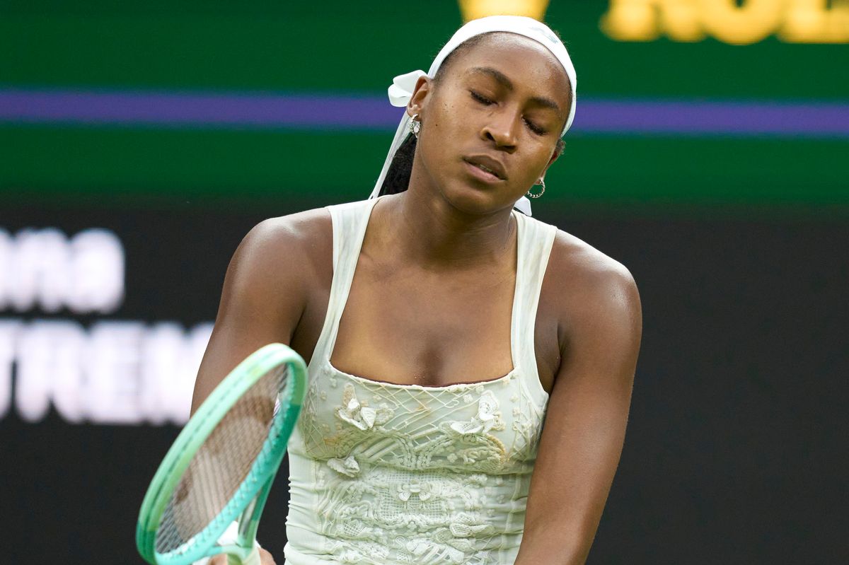 Coco Gauff of the United States reacts during her loss to Dayana Yastremska of Ukraine in her rescheduled ladies' Singles first round match on day two of The Championships Wimbledon