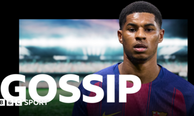 Luke Littler celebrates winning the 2026 PDC World Championship as tickertape falls