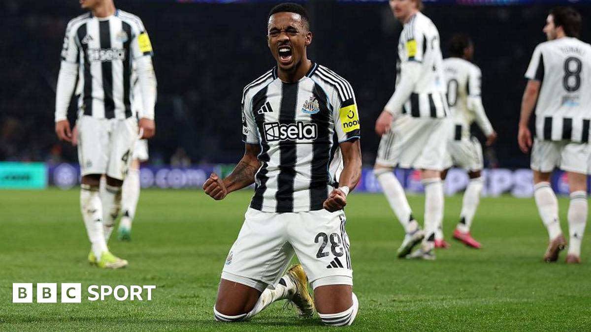 Joe Willock is on his knees and clenching his fists to celebrate scoring a goal