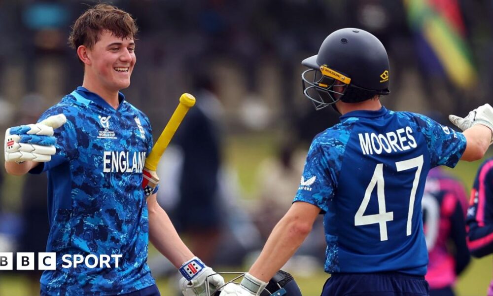 Ben Mayes is congratulated by Joe Moores