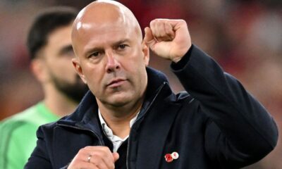 Arne Slot, Manager of Liverpool, acknowledges the fans after the Premier League match between Liverpool and Aston Villa