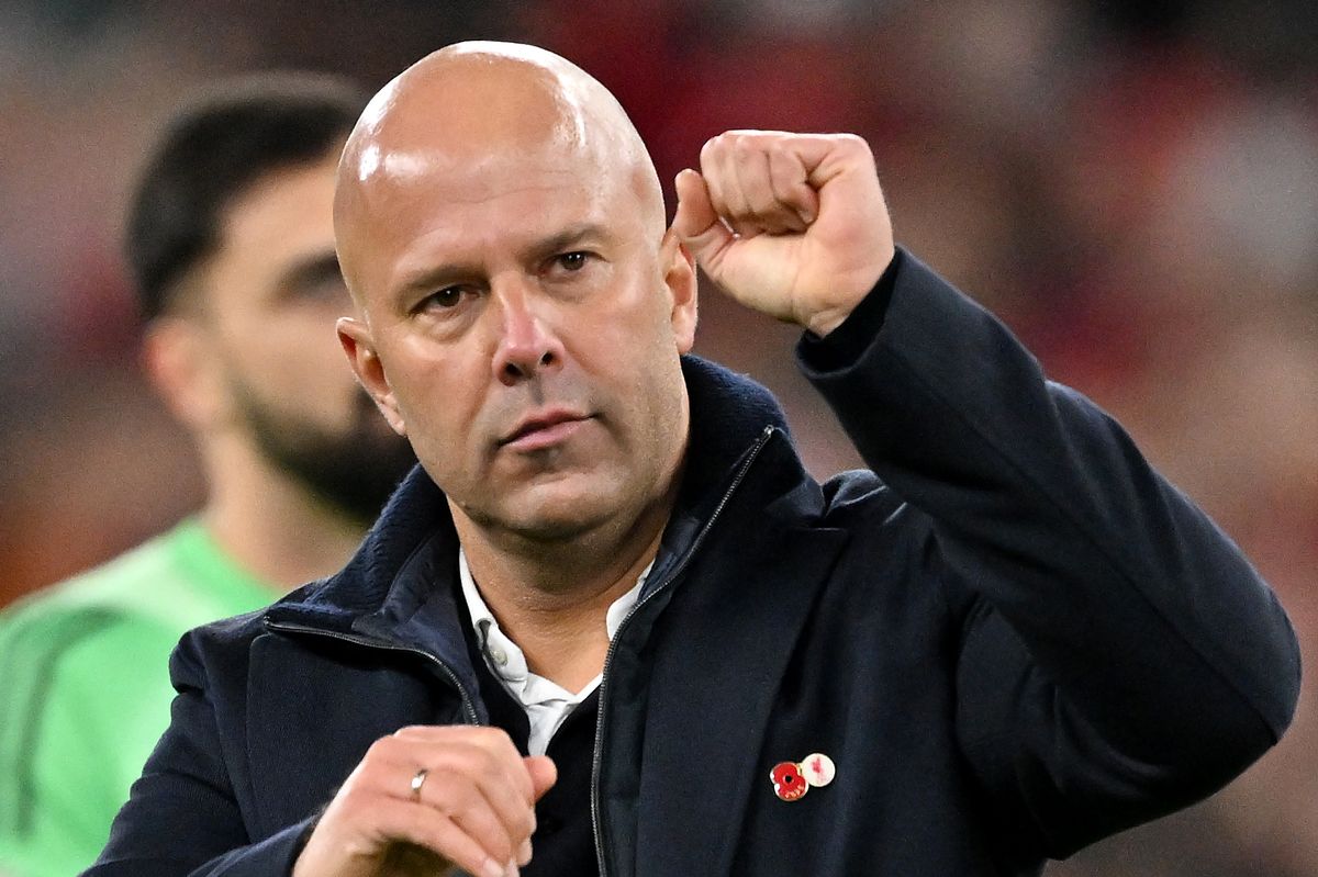 Arne Slot, Manager of Liverpool, acknowledges the fans after the Premier League match between Liverpool and Aston Villa