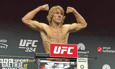 Paddy Pimblett flexes his muscles as he weighs in