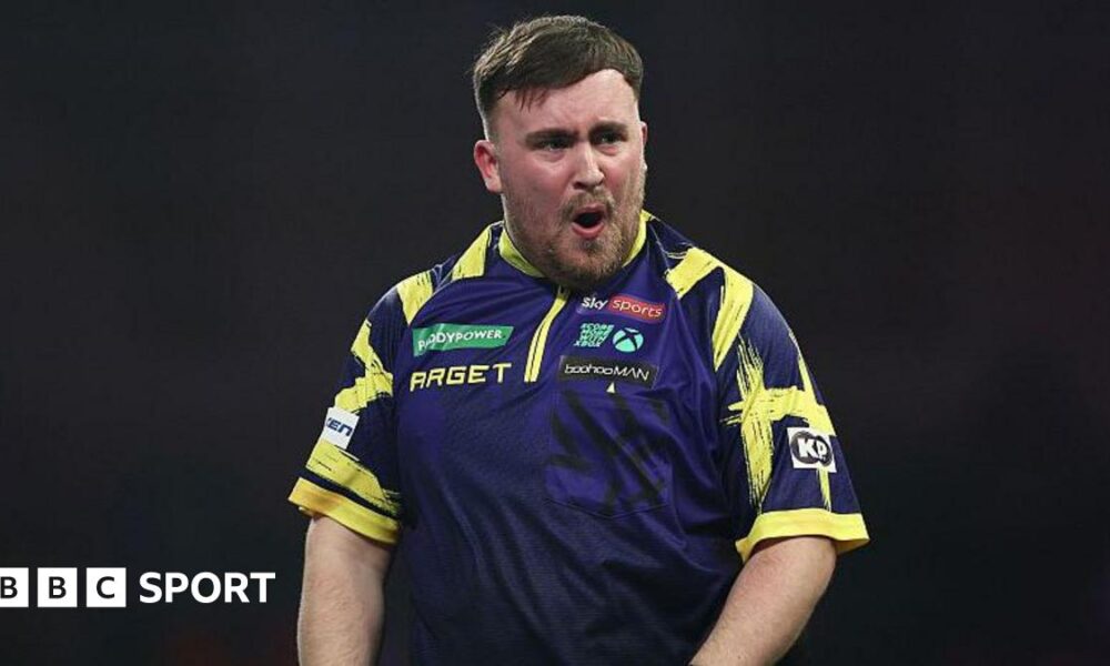 Luke Littler celebrates