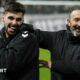 Claudio Braga and Derek McInnes celebrate Hearts' win