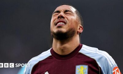 Aston Villa's Youri Tielemans grimaces after receiving an injury during the Premier League match between Newcastle United and Aston Villa
