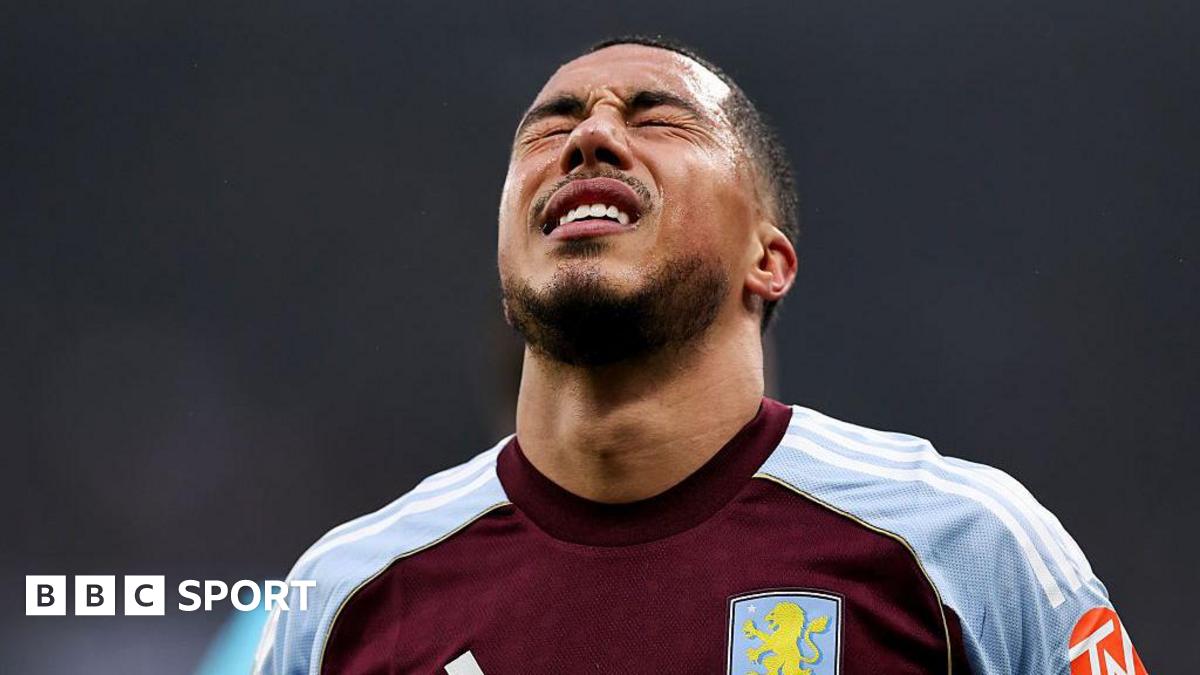 Aston Villa's Youri Tielemans grimaces after receiving an injury during the Premier League match between Newcastle United and Aston Villa