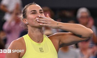 Aryna Sabalenka prepares to blow a kiss