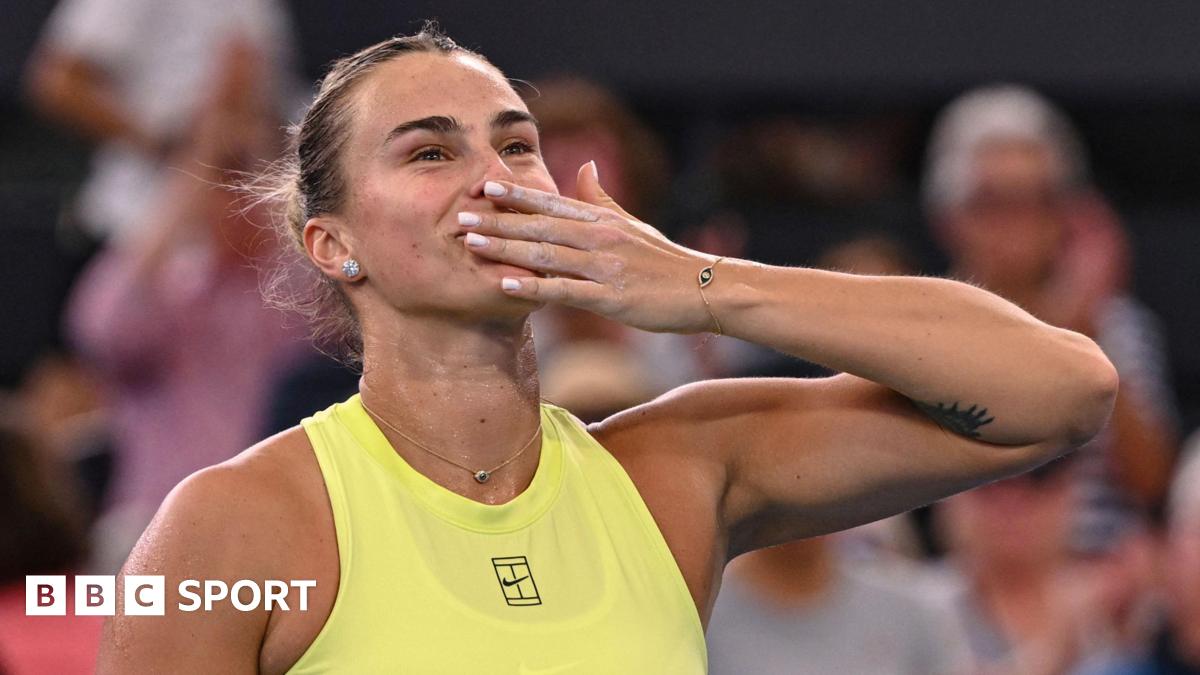 Aryna Sabalenka prepares to blow a kiss
