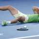 Carlos Alcaraz falls to the floor after beating Alexander Zverev