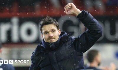 Rangers players salute their fans at Pittodrie