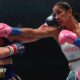 Amanda Serrano lands a right jab on Reina Tellez