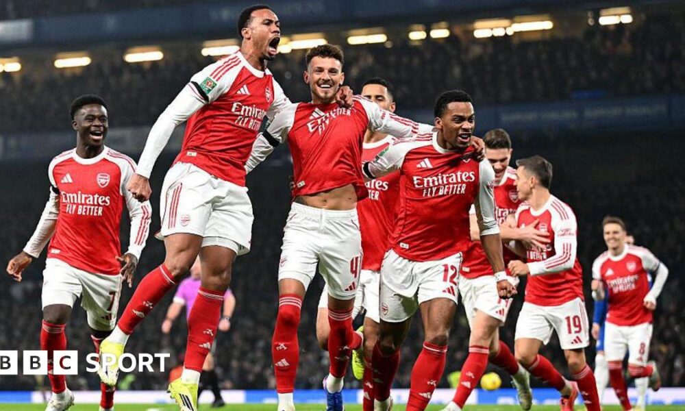 Arsenal players celebrate their goal