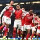 Arsenal players celebrate their goal
