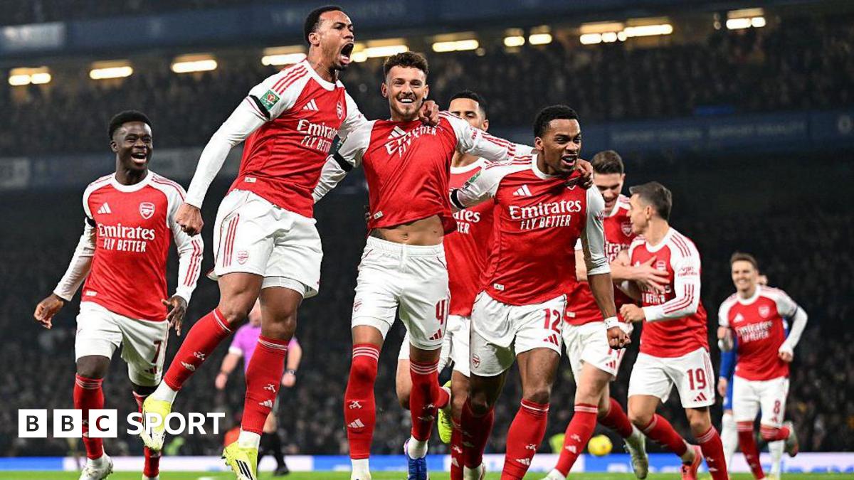 Arsenal players celebrate their goal