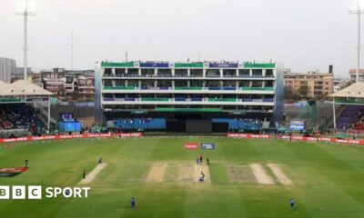 A wide angle of players on the pitch at National Stadium in Karachi