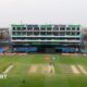 A wide angle of players on the pitch at National Stadium in Karachi