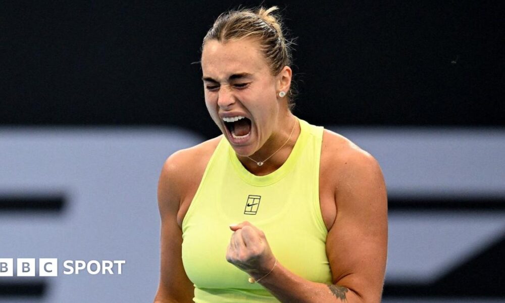 Aryna Sabalenka celebrates with a clenched fist