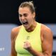 Aryna Sabalenka celebrates with a clenched fist