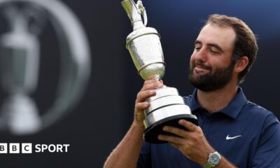 Luke Littler celebrates winning the 2026 PDC World Championship as tickertape falls