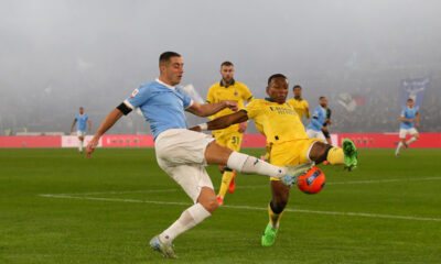 ROME, ITALY - DECEMBER 04: Adam Marusic of Lazio battles for possession with Pervis Estupinan of AC Milan during the Coppa Italia Round of 16 match between SS Lazio and AC Milan at Olimpico Stadium on December 04, 2025 in Rome, Italy. (Photo by Paolo Bruno/Getty Images)