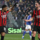 COMO, ITALY - JANUARY 15: Christopher Nkunku of AC Milan celebrates with his team-mate Adrien Rabiot after scoring their team's first goal1 from the penalty spot during the Serie A match between Como 1907 and AC Milan at Giuseppe Sinigaglia Stadium on January 15, 2026 in Como, Italy. (Photo by Marco Luzzani/Getty Images)
