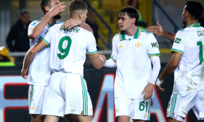 LECCE, ITALY - JANUARY 06: Artem Dobvyk of AS Roma celebrates with their teammates after scoring his team