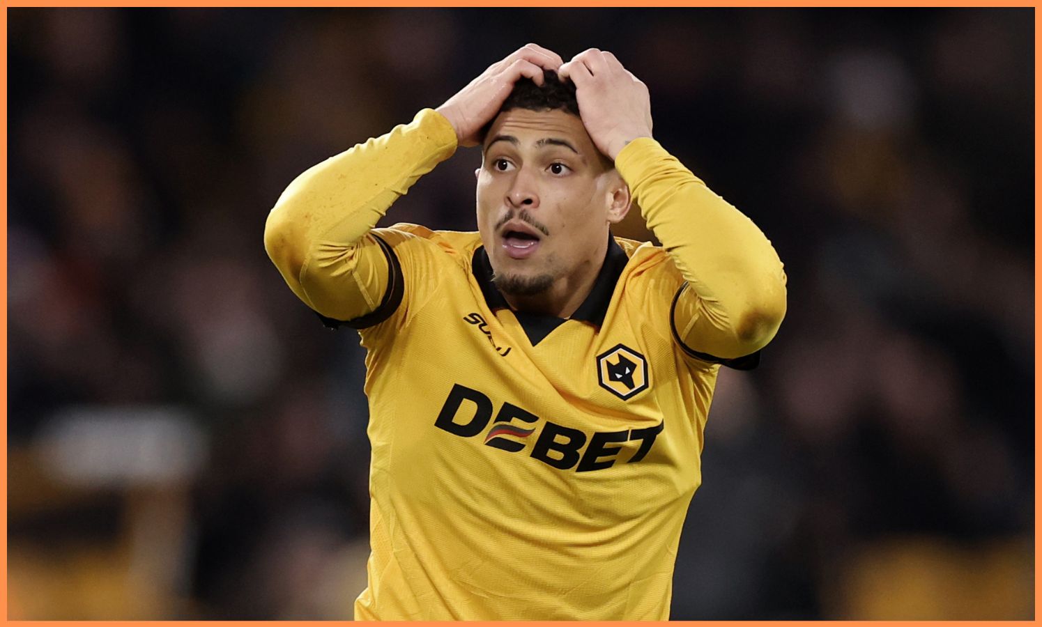 Joao Gomes reacts during Wolves vs Brentford