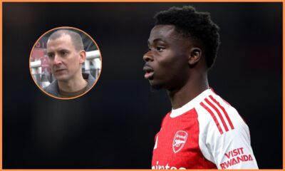 Bukayo Saka of Arsenal and journalist Charles Watts