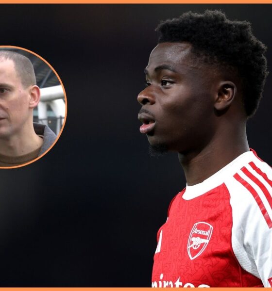 Bukayo Saka of Arsenal and journalist Charles Watts