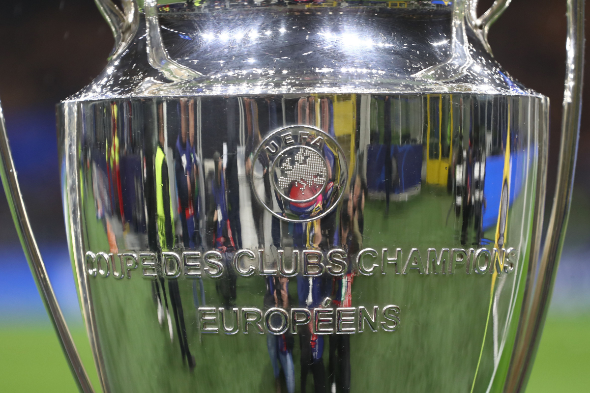 MILAN, ITALY - MARCH 11: The UEFA Champions League trophy is displayed on a plinth at the side of the pitch prior to the UEFA Champions League 2024/25 UEFA Champions League 2024/25 Round of 16 Second Leg match between FC Internazionale Milano and Feyenoord at on March 11, 2025 in Milan, Italy. (Photo by Marco Luzzani/Getty Images)