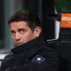 MILAN, ITALY - JANUARY 04: Cristian Chivu, Head Coach of FC Internazionale Milano, looks on prior to the Serie A match between FC Internazionale and Bologna FC 1909 at Giuseppe Meazza Stadium on January 04, 2026 in Milan, Italy. (Photo by Marco Luzzani/Getty Images)