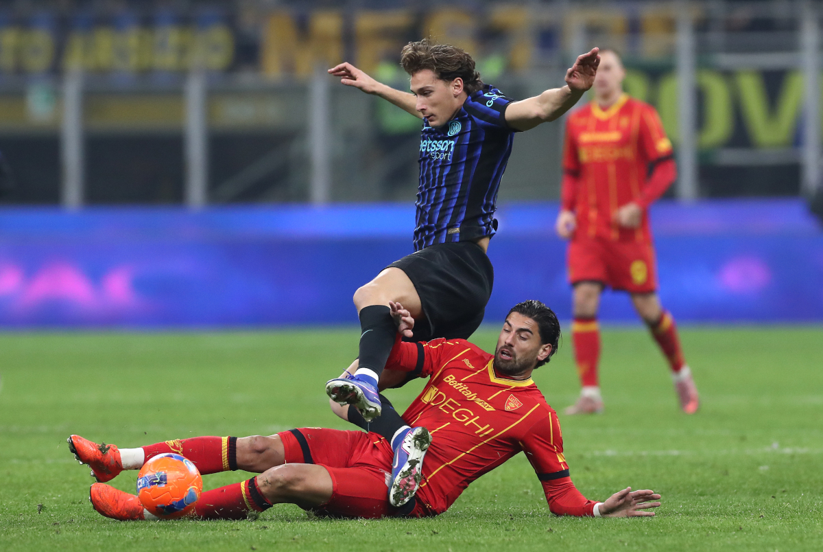 MILAN, ITALY - JANUARY 14: Francesco Pio Esposito of FC Internazionale Milano is challenged by Santiago Pierotti of US Lecce during the Serie A match between FC Internazionale and US Lecce at Giuseppe Meazza Stadium on January 14, 2026 in Milan, Italy. (Photo by Marco Luzzani/Getty Images)