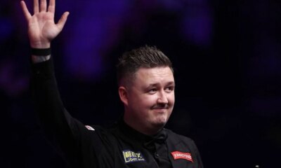 Kyren Wilson downs John Higgins in 'absolute dogfight' of Masters final