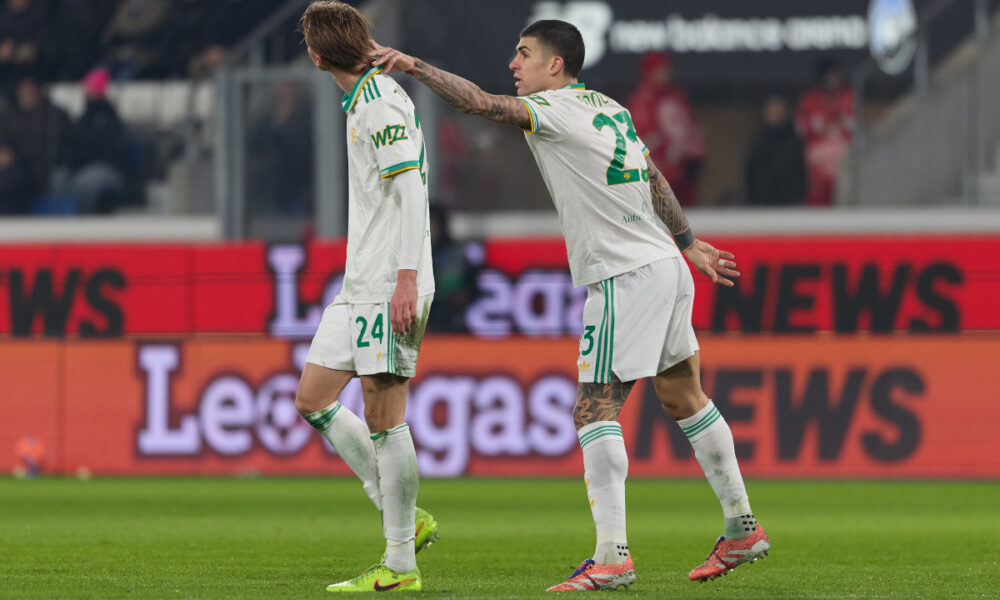 BERGAMO, ITALY - JANUARY 03: Jan Ziolkowski of AS Roma and Gianluca Mancini of AS Roma react during the Serie A match between Atalanta BC and AS Roma at New Balance Arena on January 03, 2026 in Bergamo, Italy. (Photo by Emmanuele Ciancaglini/Getty Images)