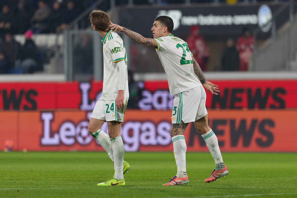 BERGAMO, ITALY - JANUARY 03: Jan Ziolkowski of AS Roma and Gianluca Mancini of AS Roma react during the Serie A match between Atalanta BC and AS Roma at New Balance Arena on January 03, 2026 in Bergamo, Italy. (Photo by Emmanuele Ciancaglini/Getty Images)