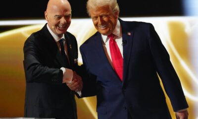 Gianni Infantino, President of FIFA, shakes hands with Donald Trump during the FIFA World Cup 2026 draw