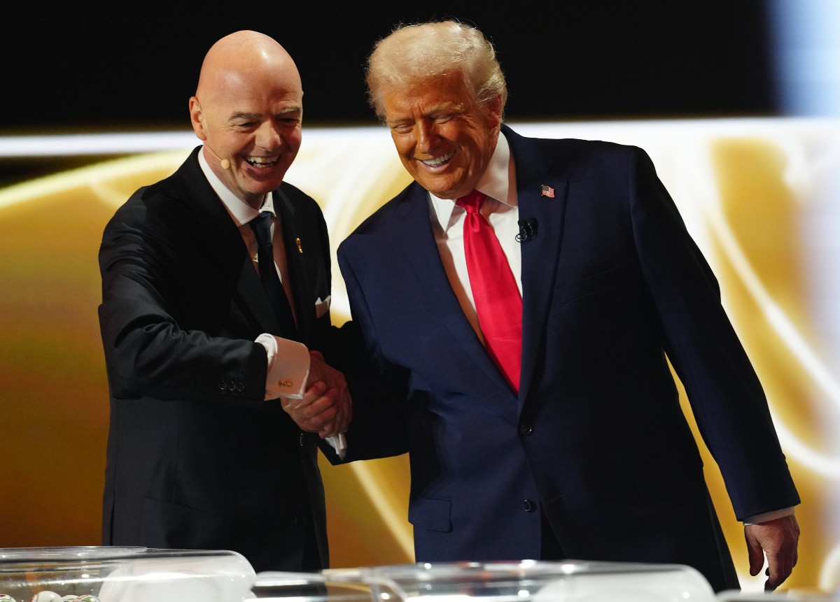 Gianni Infantino, President of FIFA, shakes hands with Donald Trump during the FIFA World Cup 2026 draw