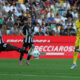 UDINE, ITALY - AUGUST 25: Giovane of Verona takes a shot at goal during the Serie A match between Udinese Calcio and Hellas Verona FC at Stadio Friuli on August 25, 2025 in Udine, Italy. (Photo by Timothy Rogers/Getty Images)