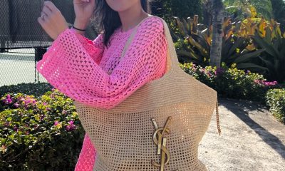 Christine Andrew in resort wear swimsuit coverup at the beach