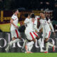 ROME, ITALY - JANUARY 25: Koni De Winter of AC Milan celebrates with teammates after scoring his team's first goal during the Serie A match between AS Roma and AC Milan at Stadio Olimpico on January 25, 2026 in Rome, Italy. (Photo by Paolo Bruno/Getty Images)