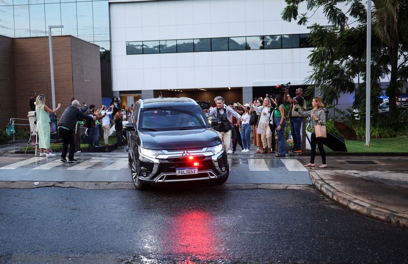 Brazil’s Bolsonaro leaves hospital after surgeries, returns to prison