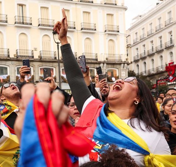 Venezuelan opposition activists in Madrid warily cheer Maduro capture