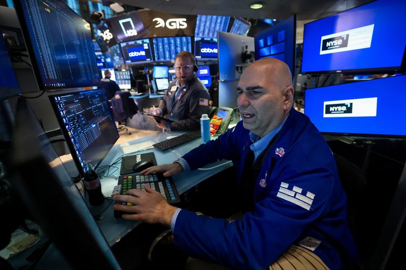 Wall St futures rise as chipmakers advance at end of choppy week