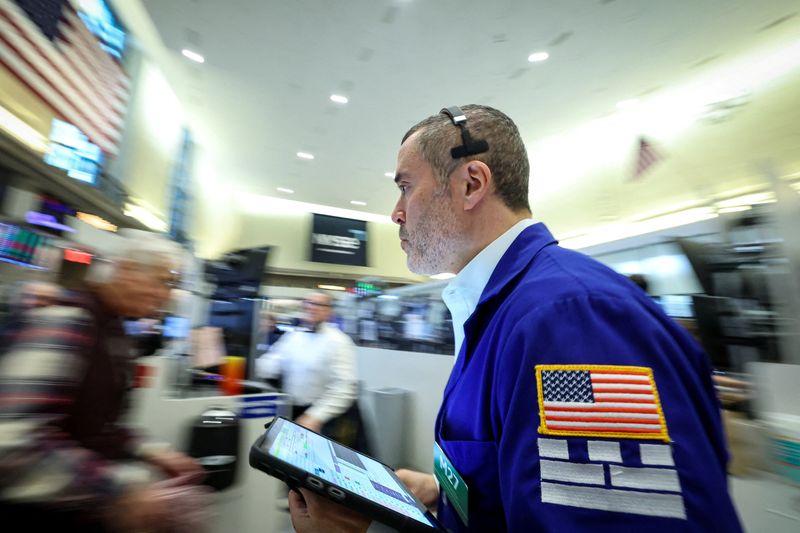 US bank stocks fall as investors await credit card rate cap deadline