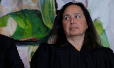 US judge blocks Trump administration’s push to end legal status of 8,400 migrants