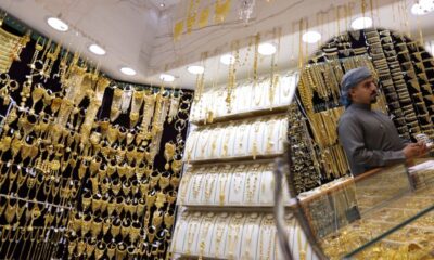 Gold races to $5,100 record peak on frantic safe-haven demand