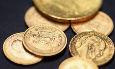 Gold’s blistering rally continues past $5,200 as dollar plunges