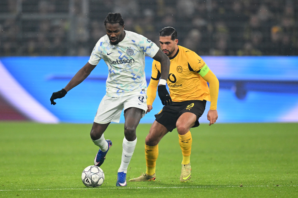 DORTMUND, GERMANY - JANUARY 28: Marcus Thuram of FC Internazionale Milano is challenged by Emre Can of Borussia Dortmund during the UEFA Champions League 2025/26 League Phase MD8 match between Borussia Dortmund and FC Internazionale Milano at BVB Stadion Dortmund on January 28, 2026 in Dortmund, Germany. (Photo by Stuart Franklin/Getty Images)